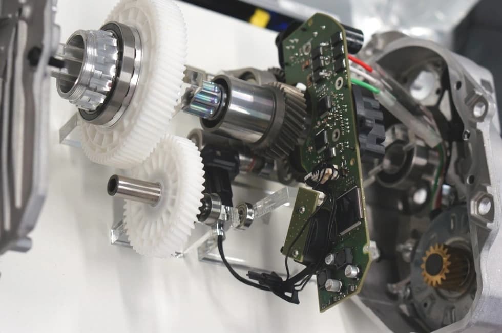 E-bike controller being tested and replaced in a workshop