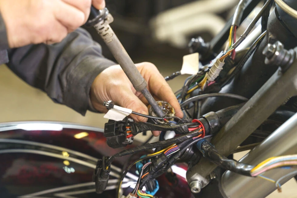 Technician conducting an electric system diagnostic on an eBike to ensure optimal performance and safety