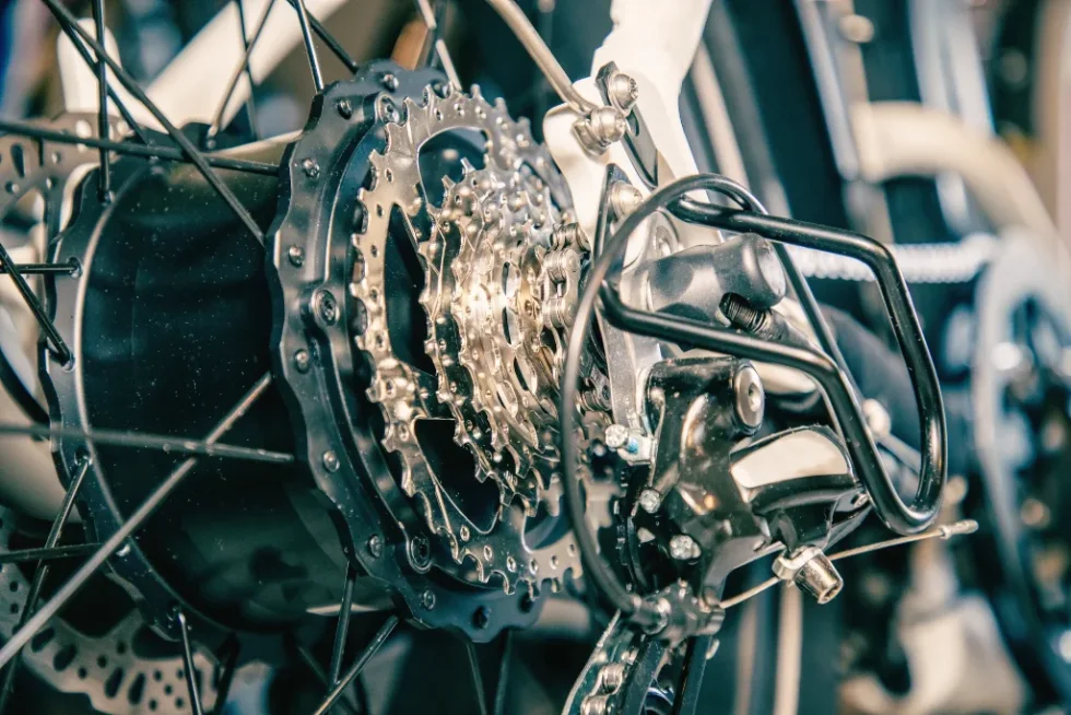 Technician performing motor maintenance on an eBike for enhanced performance and longevity